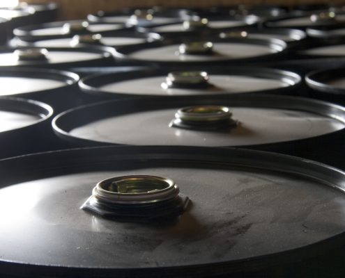 Rows of oil drums in the storage facility